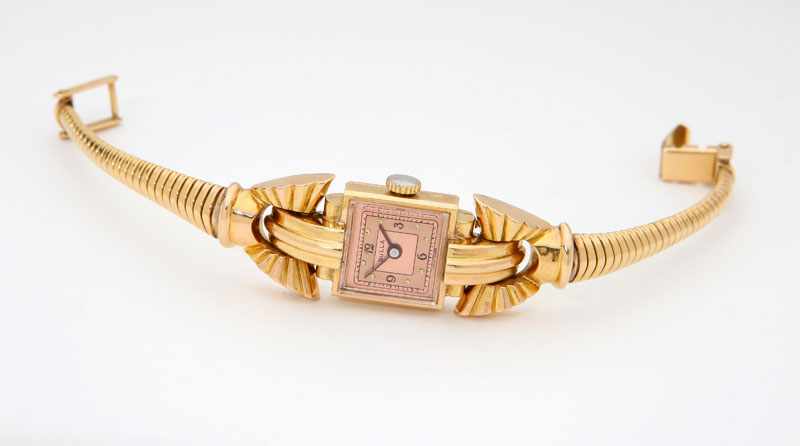 Appraisal: With square two-tone pink dial reads ''Bulla Swiss Made'' attached