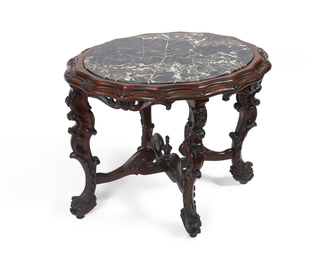 Appraisal: MARBLE TOP CARVED TABLE Carved all over including top legs