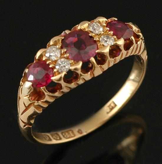 Appraisal: An Antique ruby and diamond ring The half hoop design