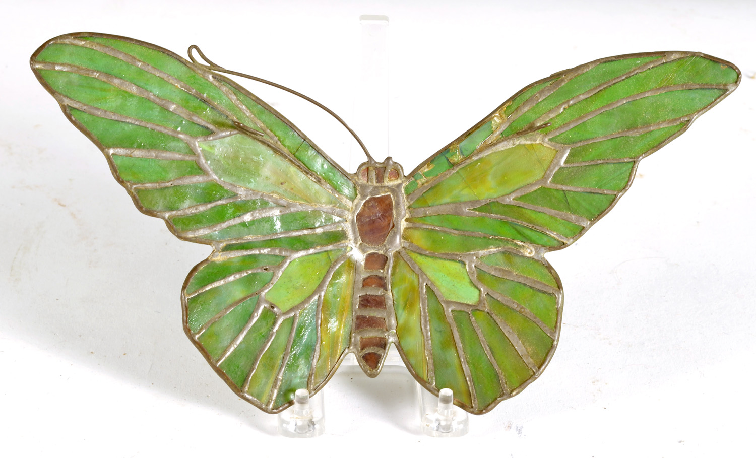 Appraisal: TIFFANY-STYLE LEADED GLASS ORNAMENT in the form of a butterfly