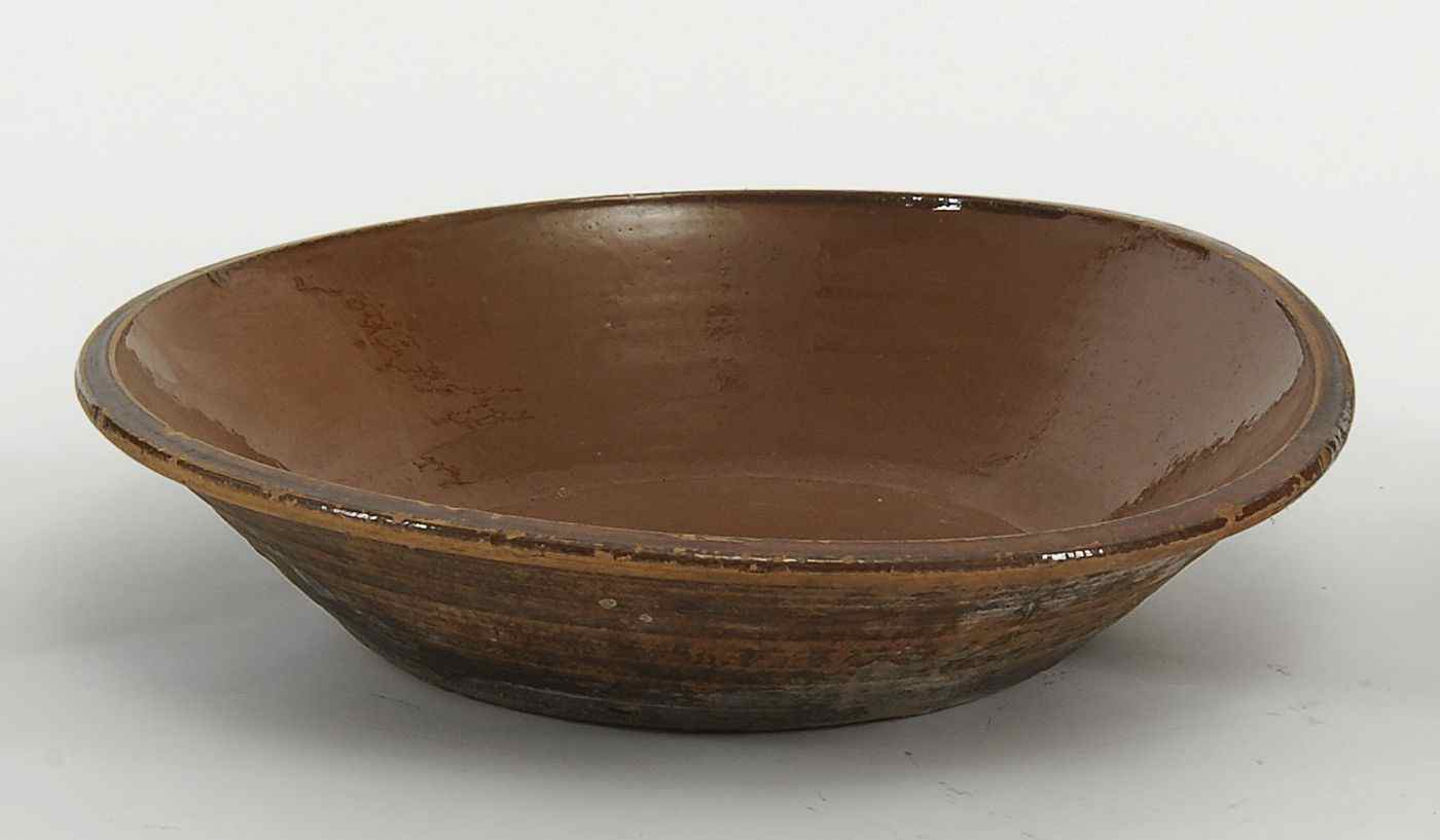 Appraisal: ANTIQUE AMERICAN REDWARE BOWLEarly th CenturyWith glazed interior Diameter Provenance