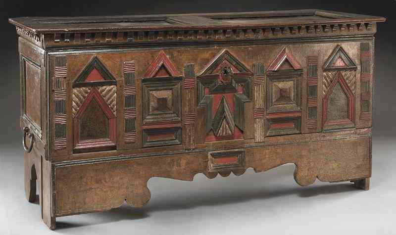 Appraisal: Continental polychrome wood cassonewith geometric panels iron handles and key