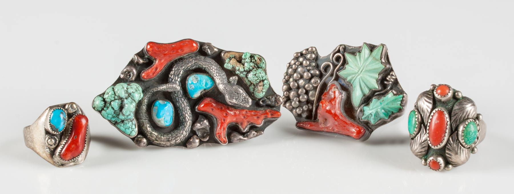 Appraisal: Four Vintage Navajo Silver Turquoise Coral Rings ozt including stones