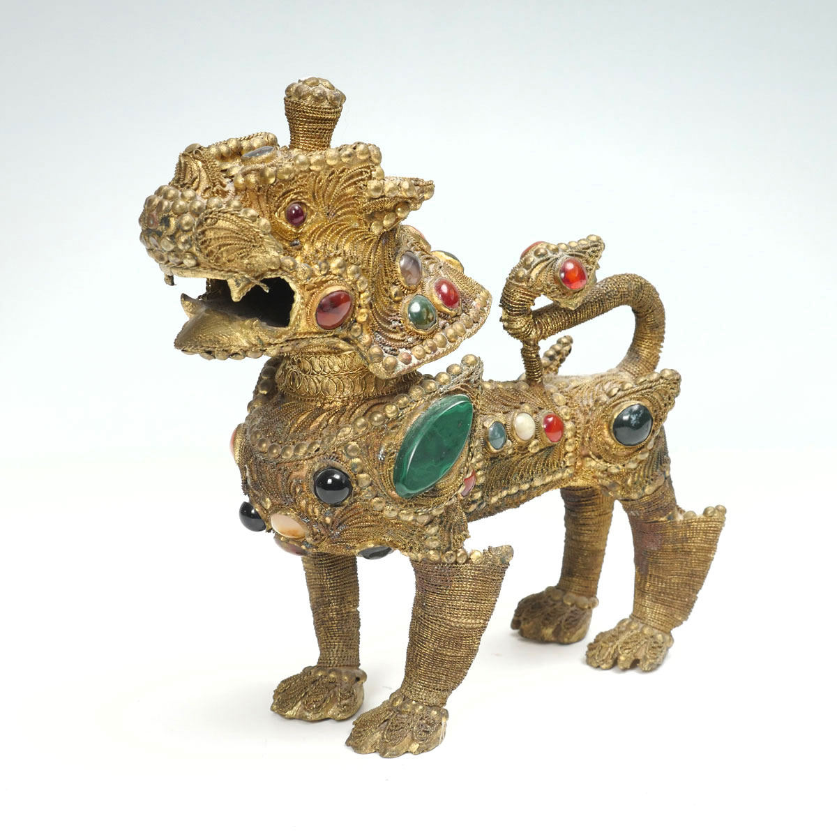 Appraisal: GILT CHINESE TIBETAN FOO DOG Early Tibetan Gilt bronze Foo