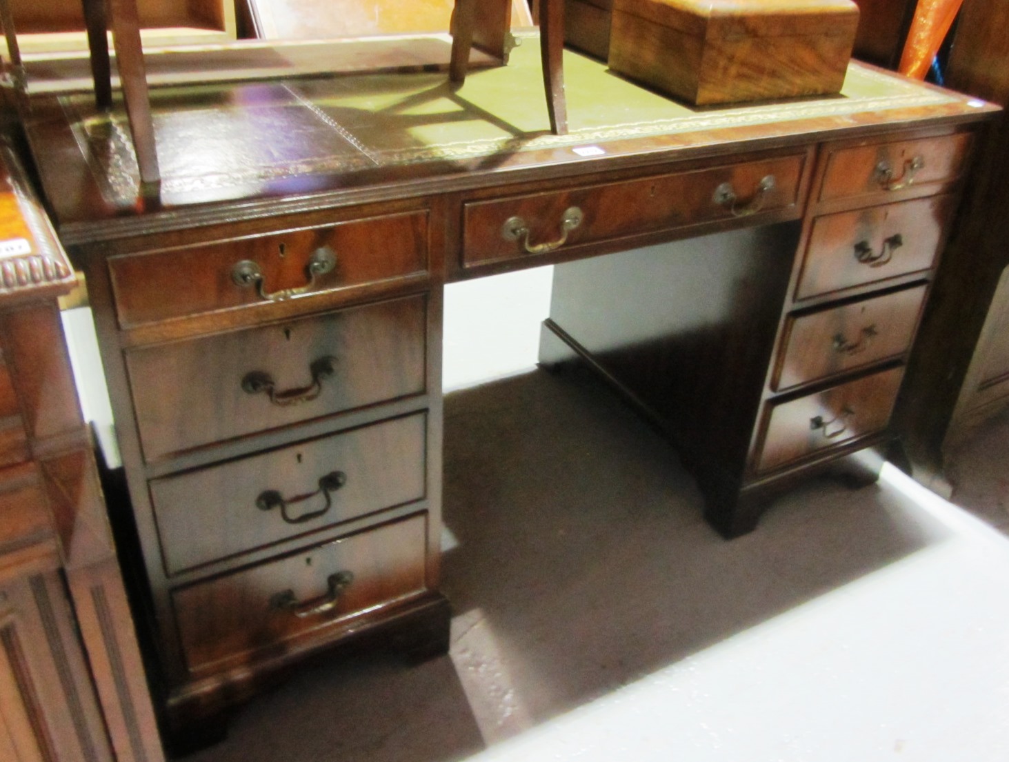 Appraisal: A modern mahogany twin pedestal desk