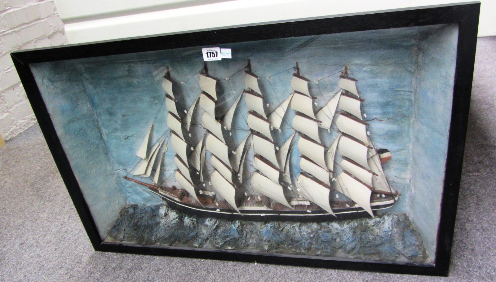 Appraisal: A painted wood diorama of a five masted rigged ship