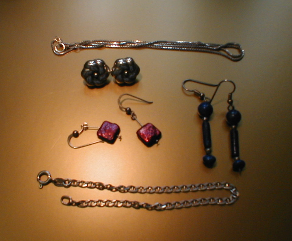 Appraisal: Four pairs of silver earrings one silver bracelet and one