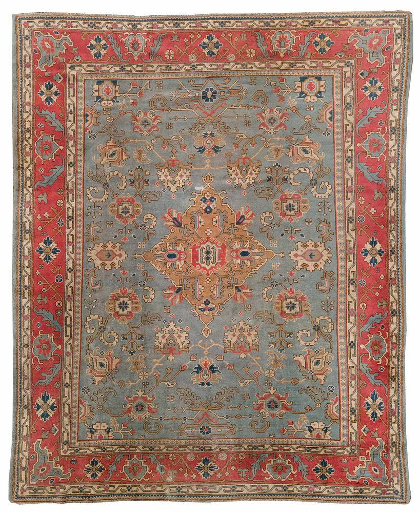 Appraisal: Oushak Carpet th century central diamond with blue field trailing