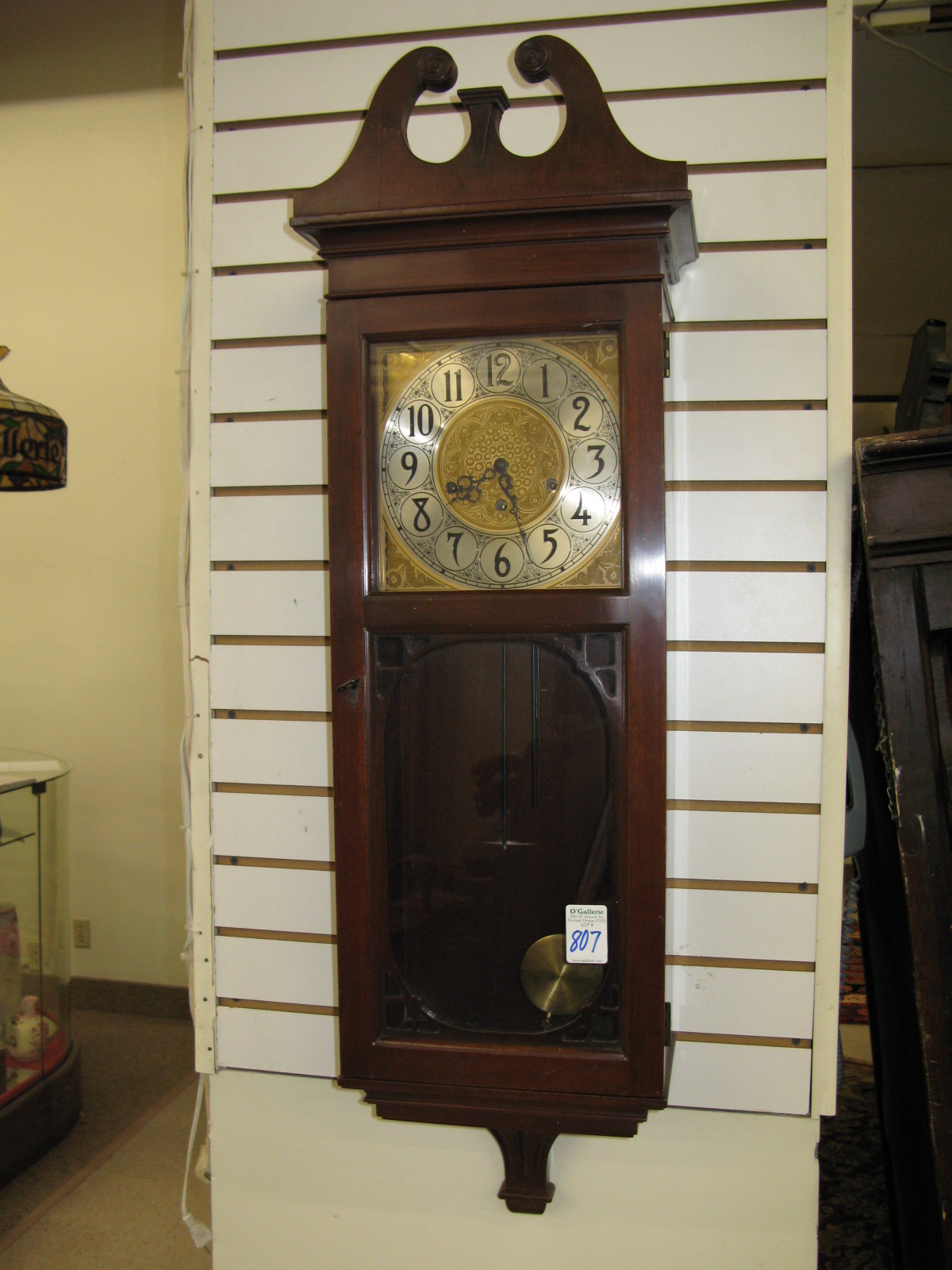 Appraisal: A MAHOGANY CASED CHIMING WALL CLOCK F Mauthe Clock Co