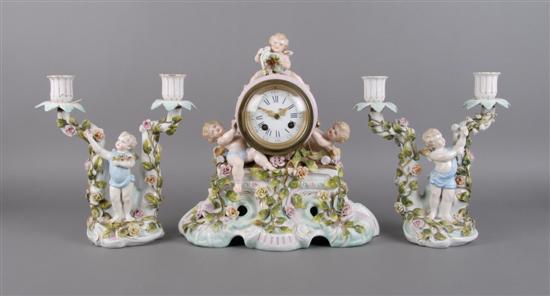 Appraisal: A Sitzendorf Porcelain Three Piece Clock Garniture Height of clock