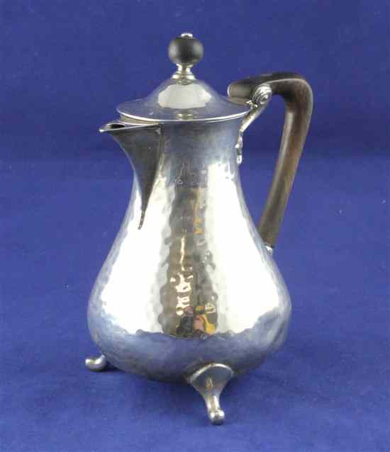 Appraisal: An Edwardian silver hot water jug of baluster form with