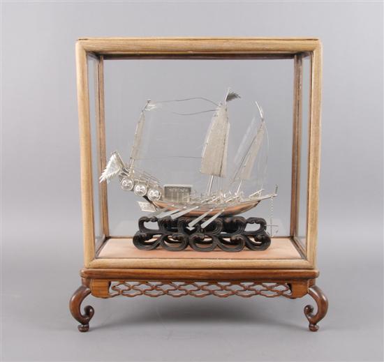 Appraisal: An Asian Silver Model of a Boat Height of case