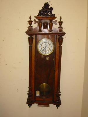 Appraisal: A VIENNA WALL CLOCK the weight driven movement stamped Gustav