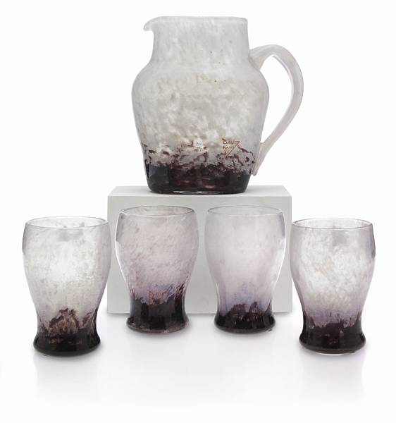 Appraisal: A Daum Nancy mottled glass pitcher and four tumblers circa