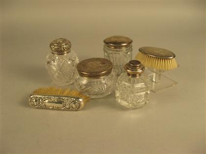 Appraisal: Sterling silver mounted dressing table articles Including brushes and sterling