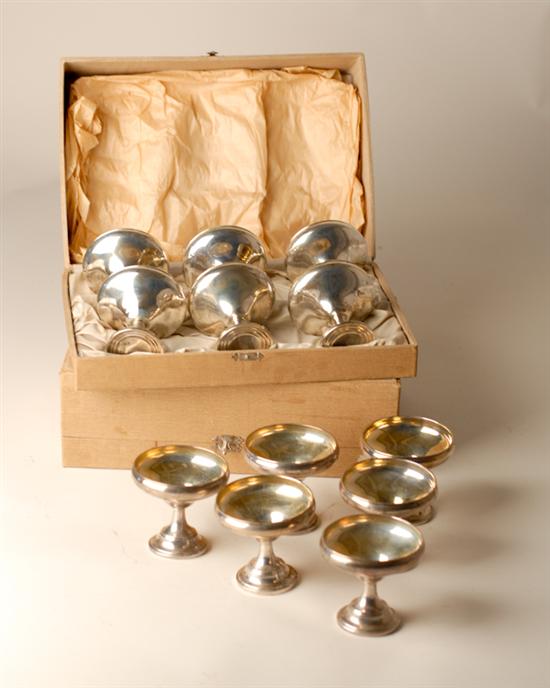 Appraisal: Twelve Sterling Sherberts with weighted bases and gilt washed bowls