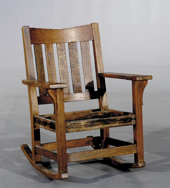 Appraisal: Arts Crafts oak rocking chair Stickley circa - five-slat back