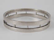 Appraisal: A Danish sterling silver bangle by Hans Hansen marked s