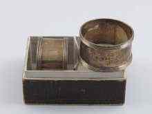 Appraisal: A pair of silver napkin rings with reeded borders London