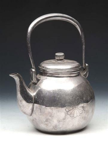 Appraisal: A SILVER JAPANESE MEIJI TEAPOT with stylised flower decoration