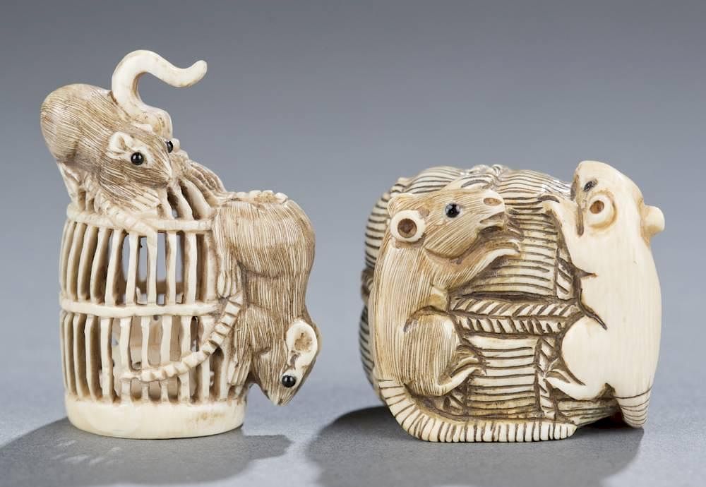 Appraisal: Two Japanese ivory netsuke with rats A group of Two