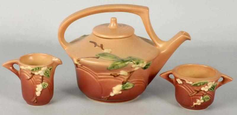 Appraisal: Roseville -Piece Pink Snowberry Teapot Set Condition Very Good -