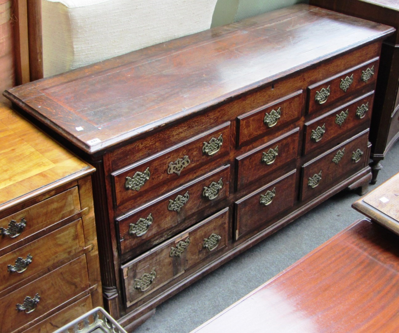 Appraisal: A th century mahogany banded oak mule chest the lift