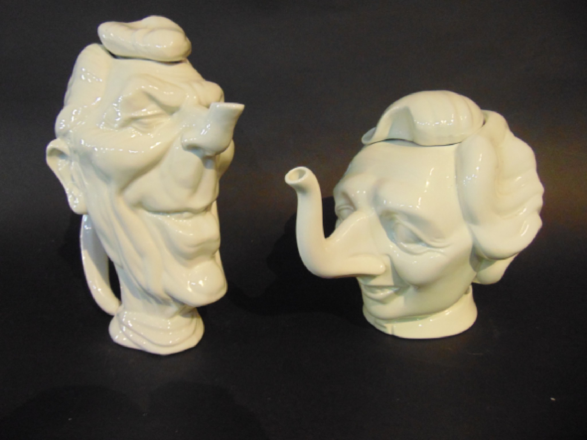 Appraisal: A pair of white glazed 's Carlton ware type humorous