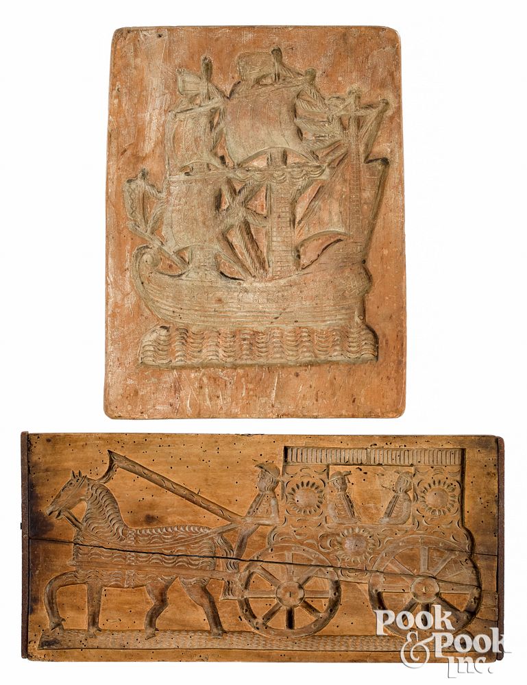 Appraisal: Two Dutch carved cakeboards th c decorated wi Two Dutch