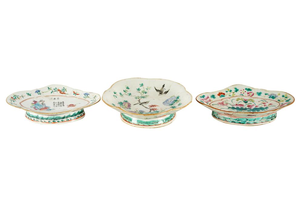 Appraisal: THREE CHINESE FOOTED DISHESone with round scalloped design Provenance The