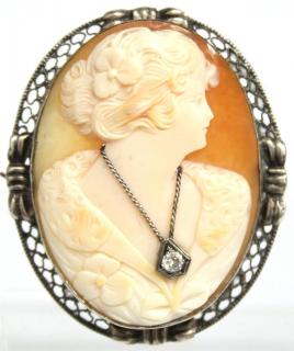 Appraisal: Diamond Antique depicting a patrician woman mounting a diamond as