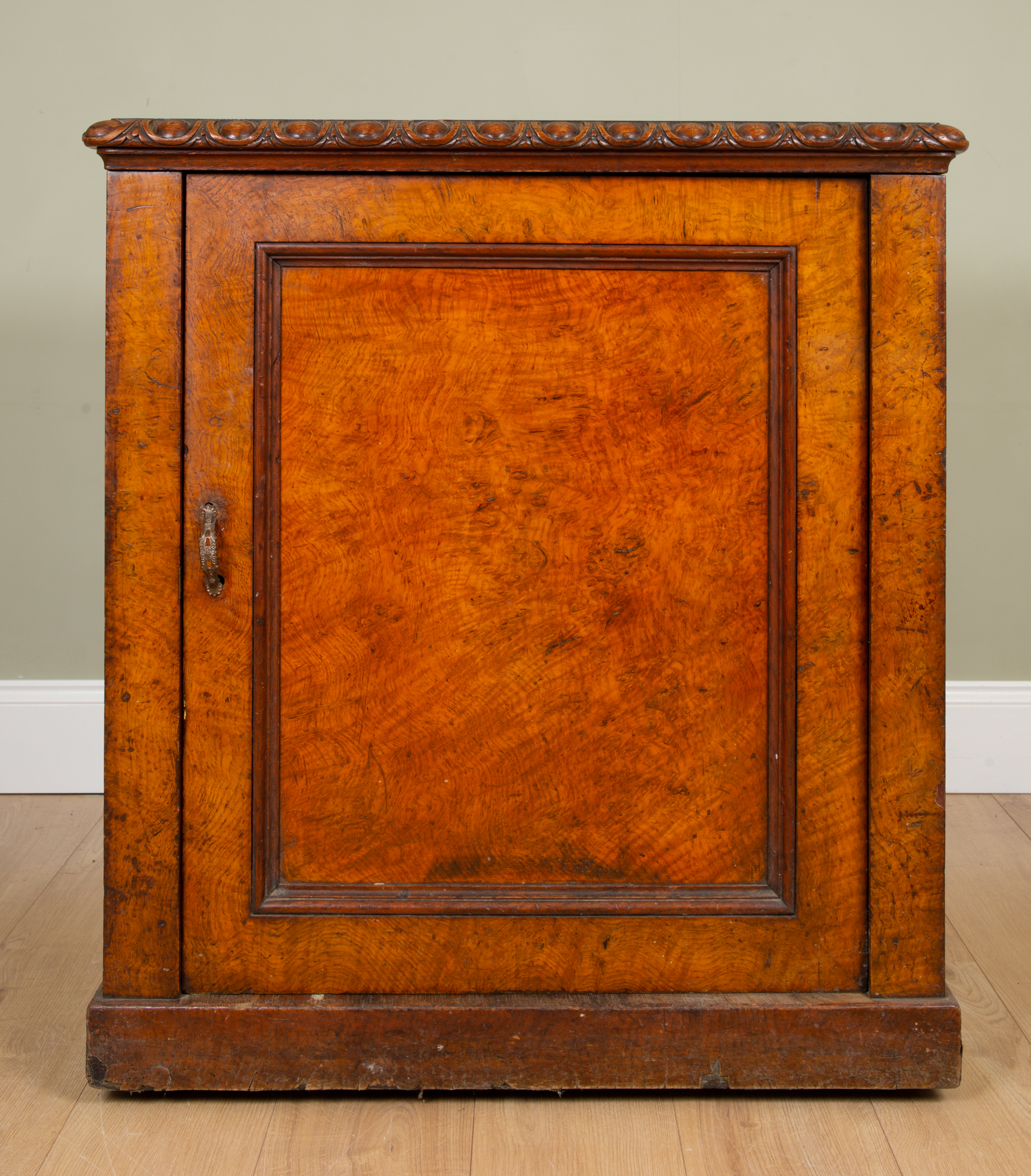 Appraisal: A Victorian burr oak and mahogany dining room warming cupboard