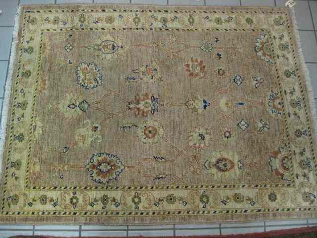 Appraisal: Oushak Handmade Rug flowering vine on light brown tan field