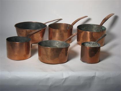 Appraisal: Six medium sized saucepans with lip and iron handle Diameters