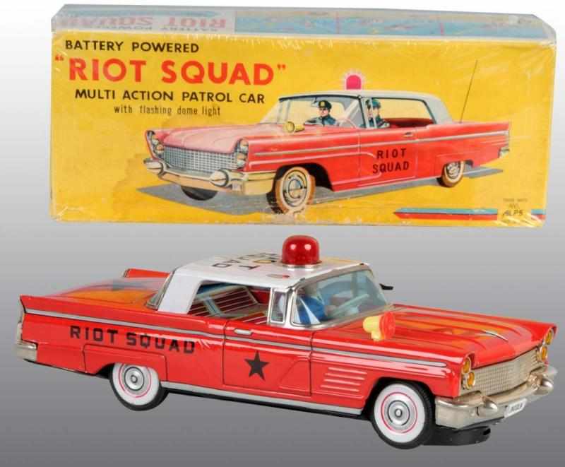 Appraisal: Tin Riot Squad Patrol Car Battery-Operated Toy Description Japanese Working