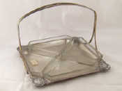 Appraisal: WMF A sandwich tray with rigid handle and four triangular