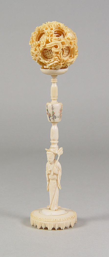 Appraisal: Carved Ivory Puzzle Ball on Ornate Carved Ivory Stand Circa