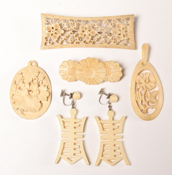 Appraisal: Lot of carved elephant ivory jewelry two pendants two pins