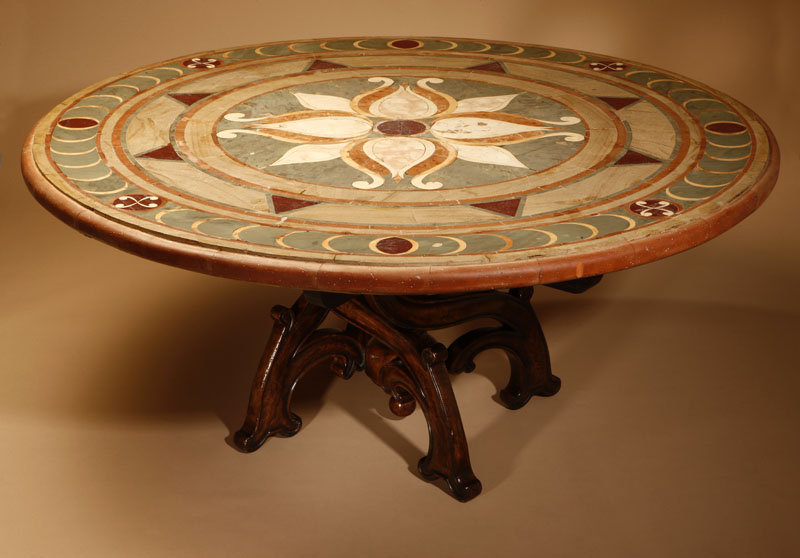 Appraisal: An Italian Baroque style scagliola dining table An Italian Baroque