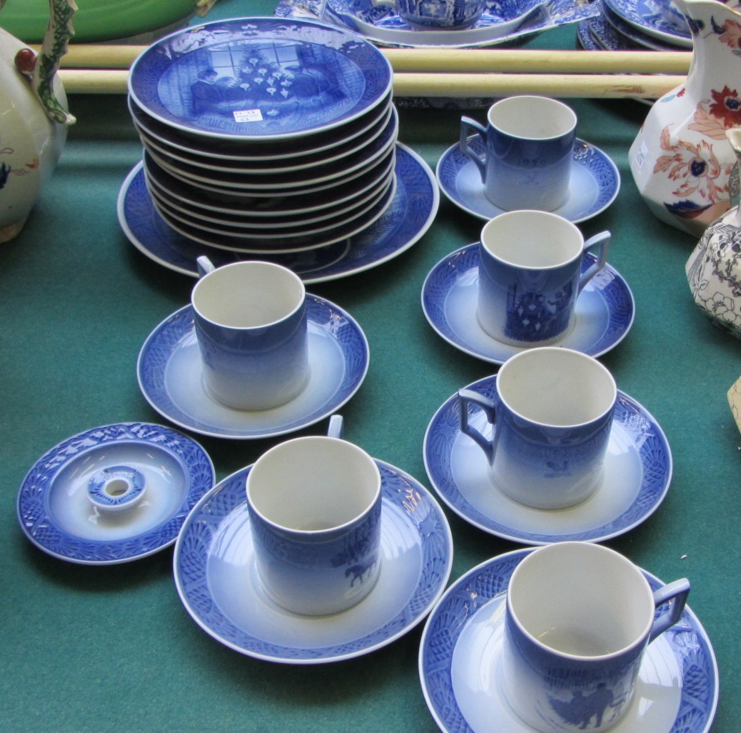 Appraisal: Ten Royal Copenhagen 'Christmas' plates a candle holder and a