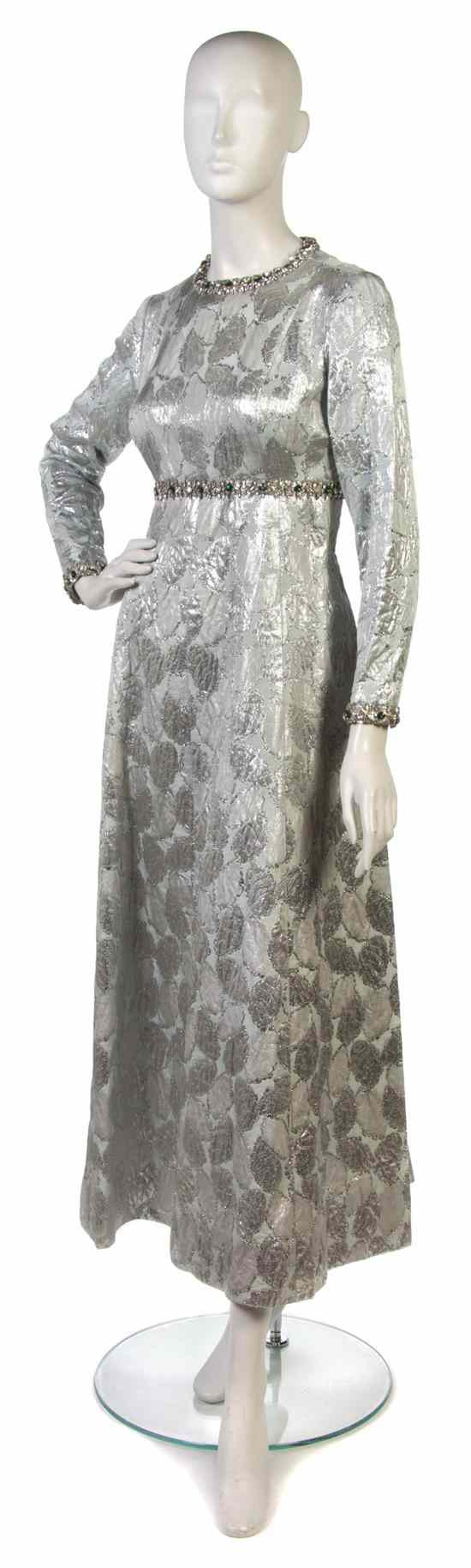 Appraisal: An Yves Saint Laurent Silver Brocade Evening Gown with green