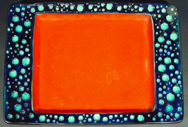 Appraisal: West German studio pottery dish decorated in a red and