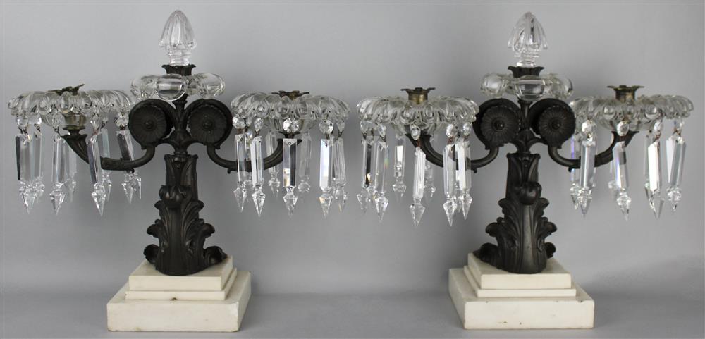 Appraisal: PAIR OF CANDELABRA WITH FOLIATE METAL ARMS ON WHITE MARBLE