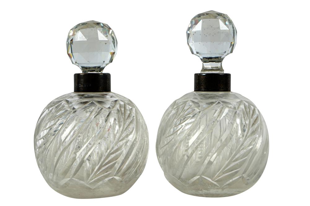 Appraisal: PAIR OF ENGLISH SILVER GLASS PERFUME BOTTLESCondition minor nicks to