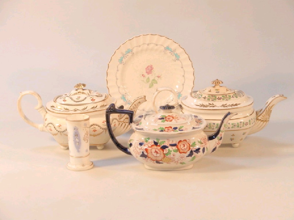 Appraisal: Two early thC Derby teapots each painted and gilt with