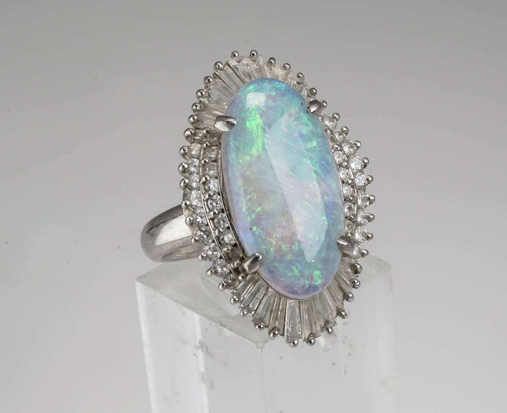 Appraisal: PLATINUM OPAL AND DIAMOND RINGPlatinum Opal and Diamond Ring Centered