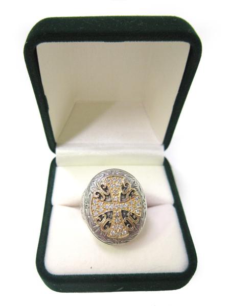 Appraisal: A DIAMOND RING IN CT GOLD AND STERLING SILVER A