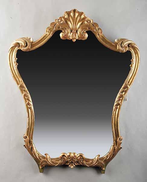 Appraisal: A Louis XV-Style Bois Dor Mirror shield shaped with rocaille