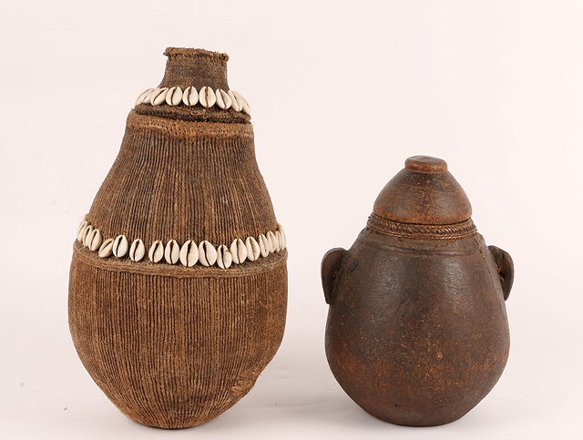 Appraisal: A KENYA SAMBURU TRIBE STRING AND COWRY SHELL MILK CONTAINER