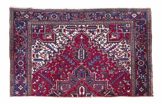 Appraisal: A Heriz Wool Rug having stylized foliate and geometric decoration